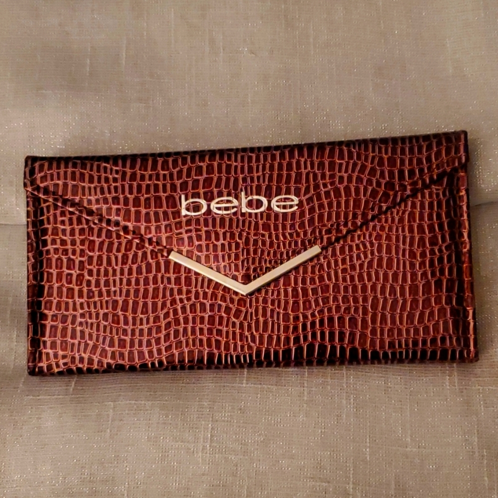 Bebe 96pc beauty clutch.